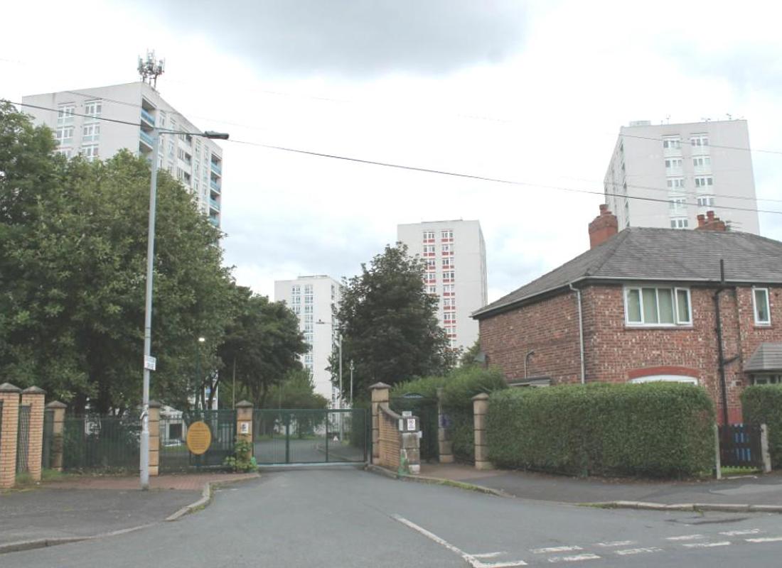 an external image of four high rise blocks of flats in north manchester